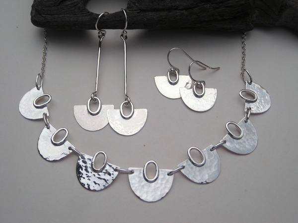 Half round seven section silver necklace and earrings