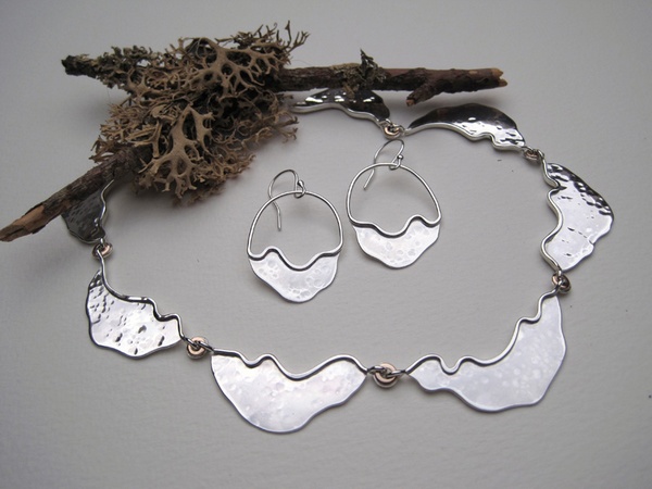 Seven section silver necklace with siver and 9ct gold spacers