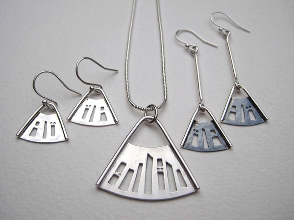 Saw pierced pendant and earrings